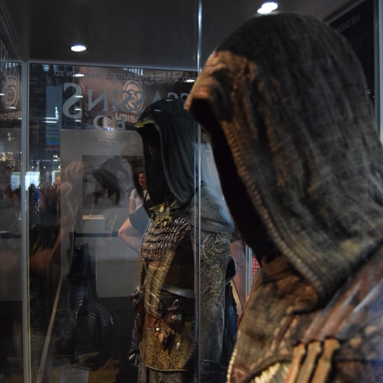 Aguilar and Maria's outfits displayed on mannequins at Gamescom